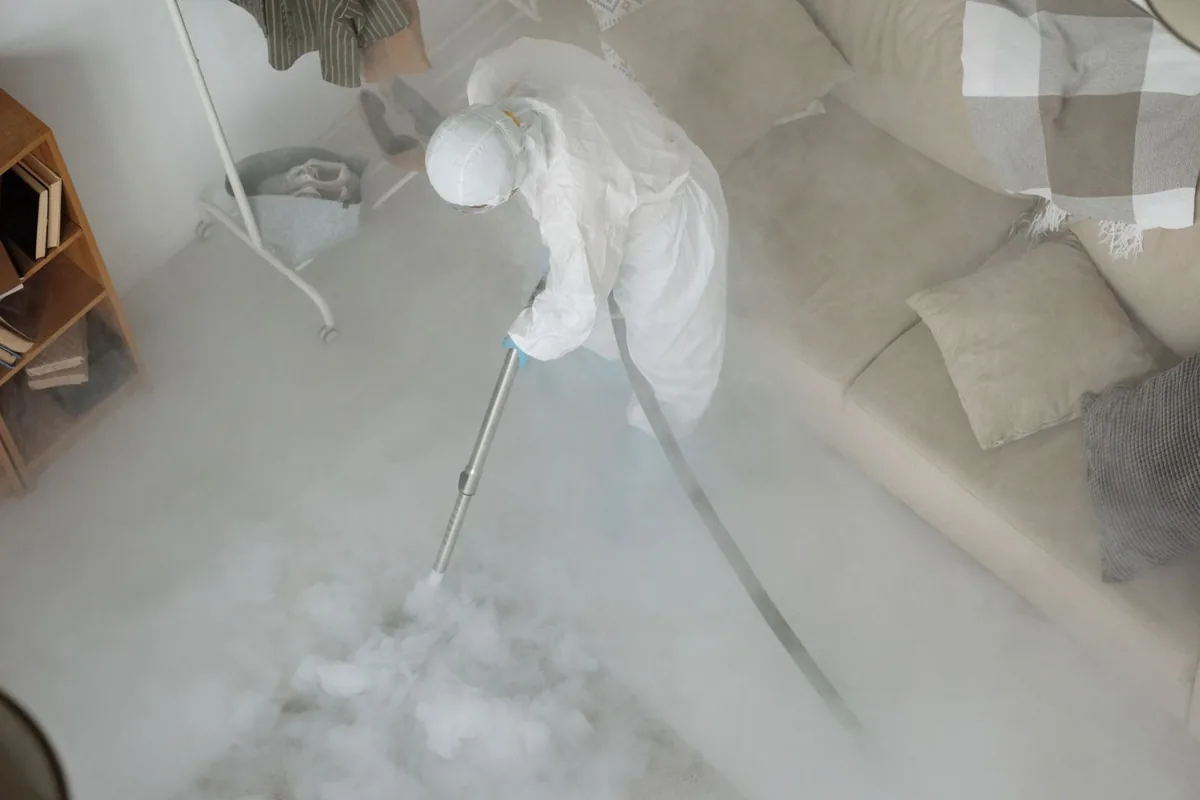 Biohazard cleanup technician in protective equipment, Dyersburg, TN